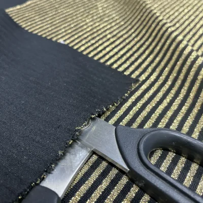 Tessuto maglina dorata e nera a righine al metro (7)