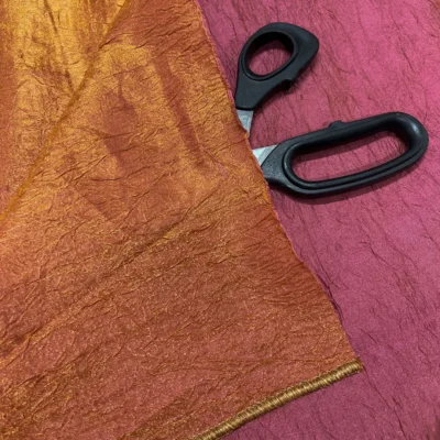 tendaggio goffrato cangiante rosa-arancio