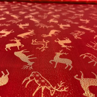 tessuto arredo renne oro e rosso