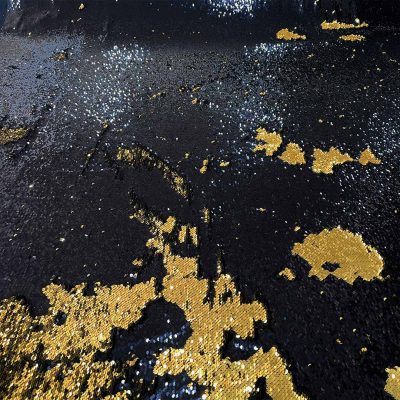 Tessuto con paillettes doppio colore oro nero 5