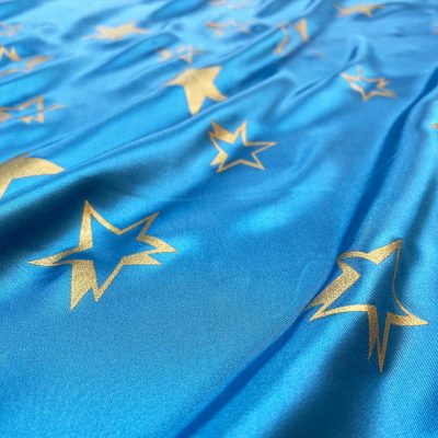 Raso con stelle dorate su sfondo turchese 6