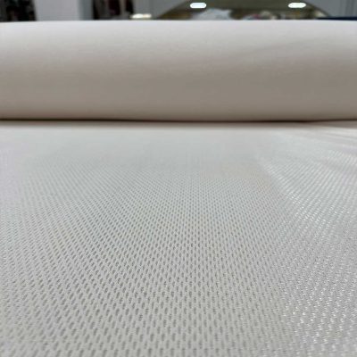 Tessuto tecnico felpato effetto rete colore bianco latte 3