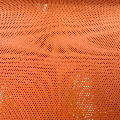 Lycra arancione vivo con pois arancioni iridescenti 5