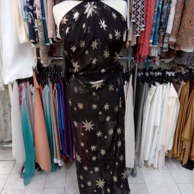 Seta fantasia stelle nere oro 140 cm