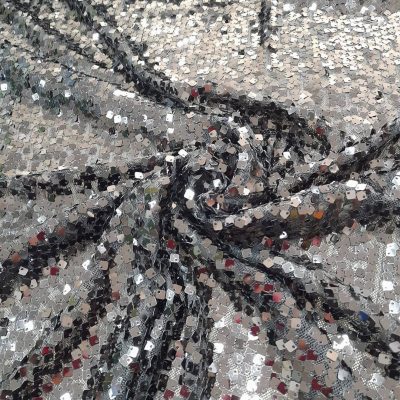 Tessuto con paillettes Alt.145 cm