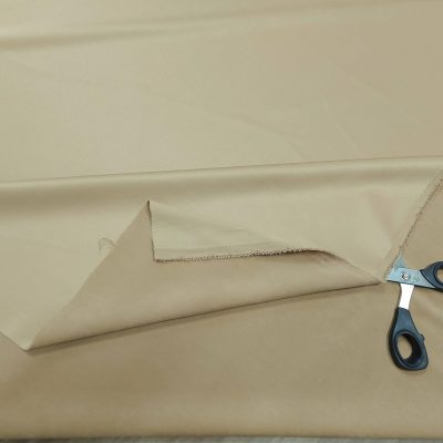 Tessuto per abiti impermeabile leggero - nocciola lucido Alt.140cm