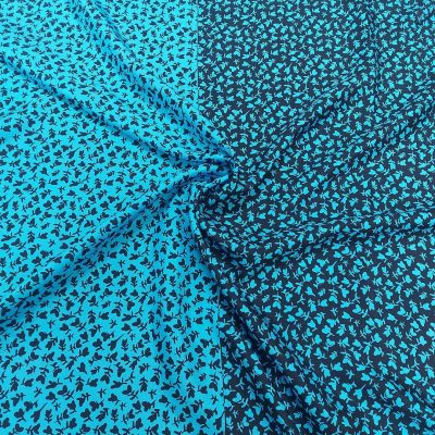 Raso di pura seta fantasia a fiori - azzurro e nero Alt.140 cm - 1