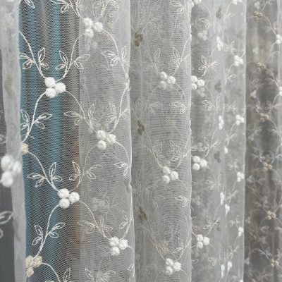 Tessuto per tende in tulle con ricami floreali bicolore 7