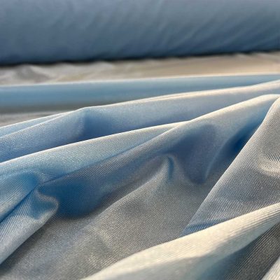 Tessuto elasticizzato effetto maglina celeste 3