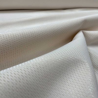 Tessuto tecnico felpato effetto rete colore bianco latte 2