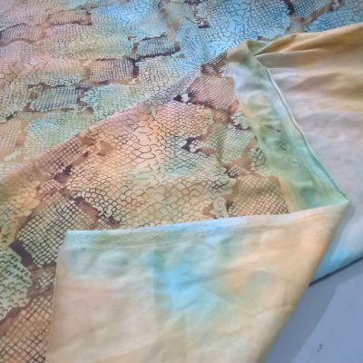 Cotone bielastico effetto serpente sfumato - giallo e azzurro Alt.150cm