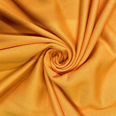 Felpa in cotone tinta unita giallo zucca al metro arricciata 1