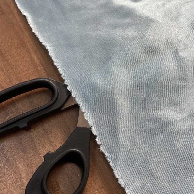 Tessuto elasticizzato effetto maglina celeste 2