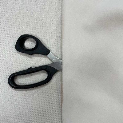 Tessuto tecnico felpato effetto rete colore bianco latte 1