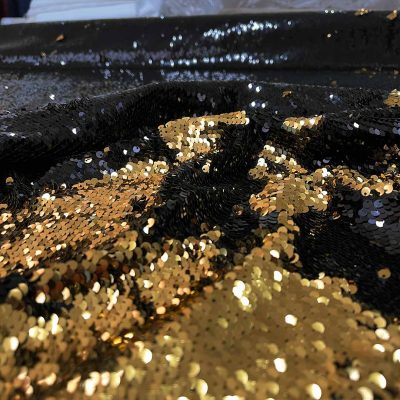 Tessuto con paillettes doppio colore oro nero 3