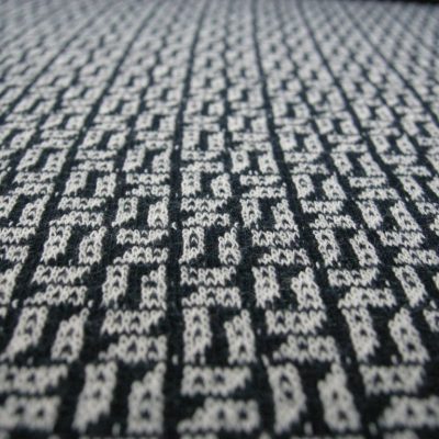 Jersey di cotone fantasia geometrica bianca - nero