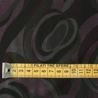 Tessuto per abiti motivo astratto- viola e grigio Alt.150cm