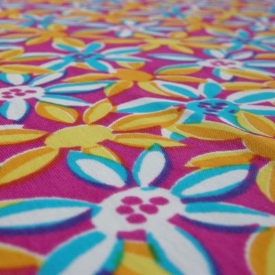 Tessuto bielastico fantasia fiorellini - sfondo fucsia Alt. 155 cm