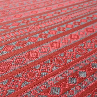 Tessuto arredo in cotone motivo damascato geometrico - rosso