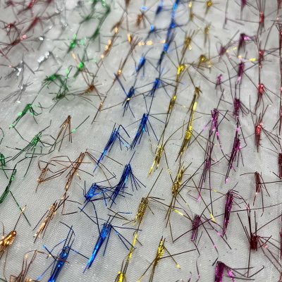 Organza trasparente con batuffoli di lam&egrave; multicolor 2