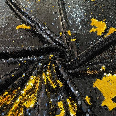 Tessuto con paillettes doppio colore oro nero 2