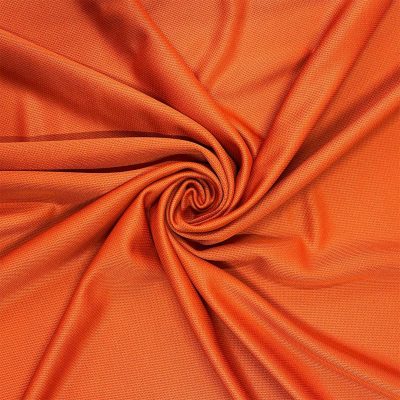 Tessuto tecnico da abbigliamento leggermente elasticizzato arancio vivo 1