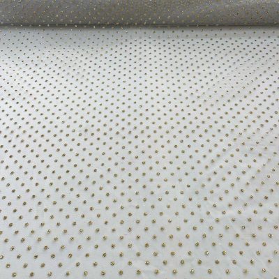 Tulle bianco con pois dorati 2