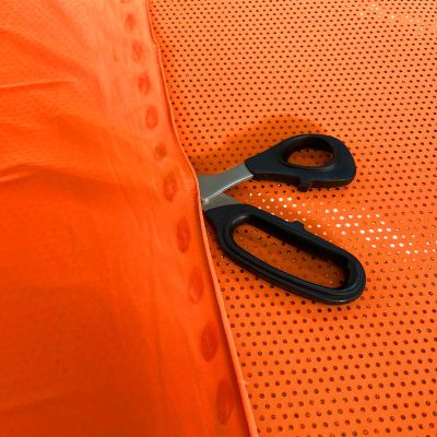 Lycra arancione vivo con pois arancioni iridescenti 1