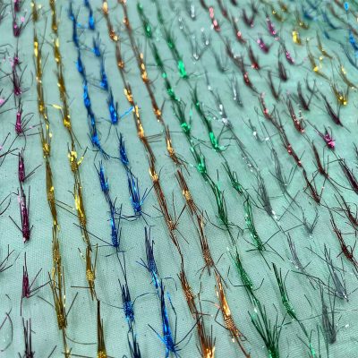 Organza verde brillante con batuffoli di lam&egrave; multicolor 1