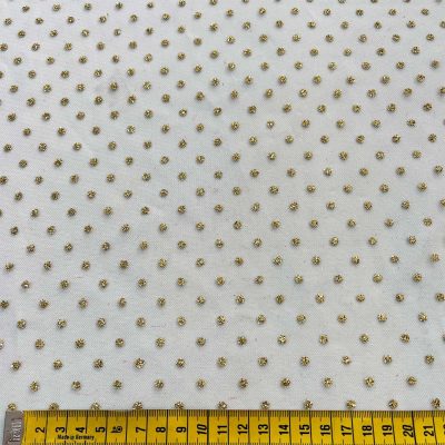 Tulle bianco con pois dorati 1