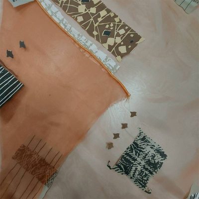 Tessuto in organza luminosa a fantasia etnica - arancione 1