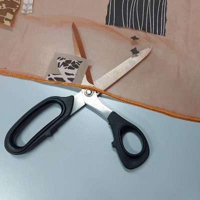 Tessuto in organza luminosa a fantasia etnica - arancione