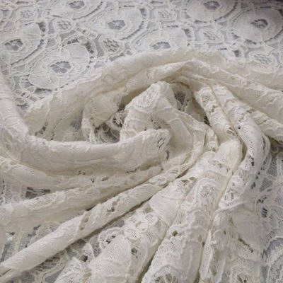 Tessuto in pizzo ricamato motivo geometrico - bianco
