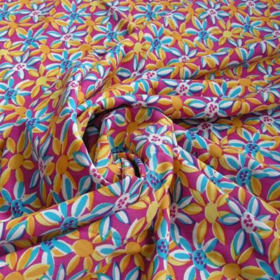 Lycra a fantasia fiorellini stilizzati colorati - sfondo fucsia