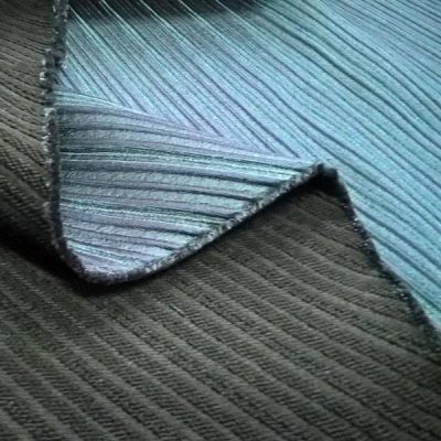 Tessuto per abiti double face a fantasia righe - blu e verde