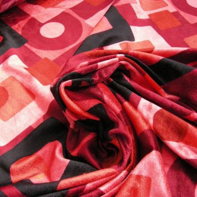 Tessuto in velluto motivo geometrico in sfumature - rosso e nero