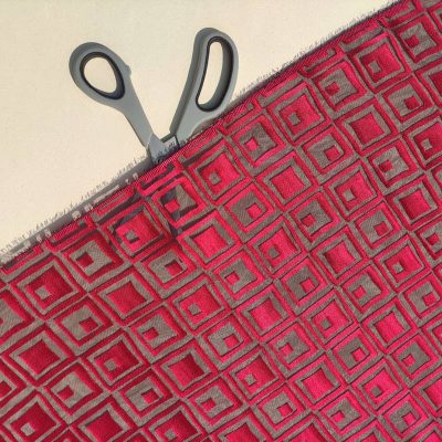 Tessuto per abiti motivo a quadri in devor&egrave; - rosso Alt.150 cm