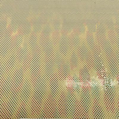 Lycra giallina con pois glitterati multicolor cangianti 2