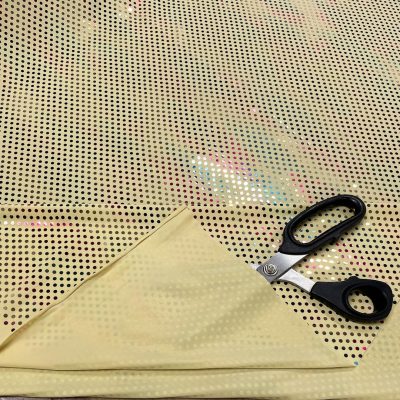 Lycra giallina con pois glitterati multicolor cangianti 1
