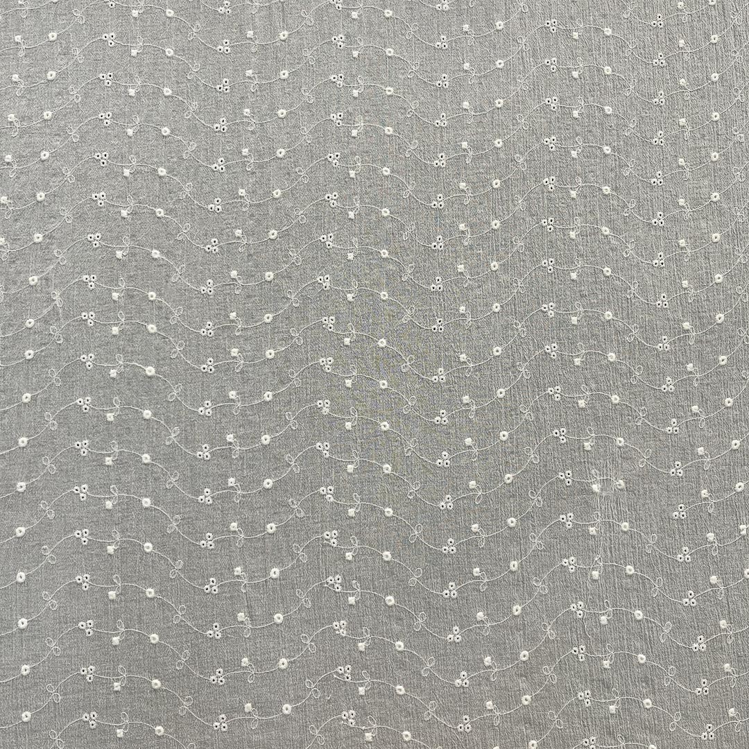 Tessuto da abbigliamento sangallo goffrato bianco naturale 7