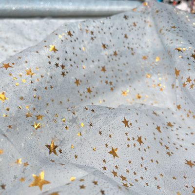 Organza azzurra con stelle metallizzate oro 1