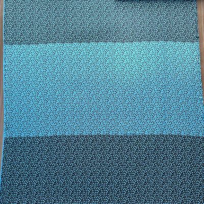 Raso di pura seta fantasia a fiori azzurro e nero 1