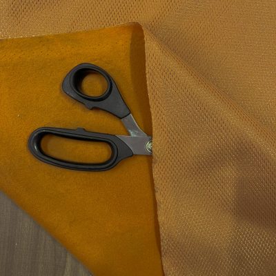 Tessuto tecnico felpato effetto rete colore ocra 2