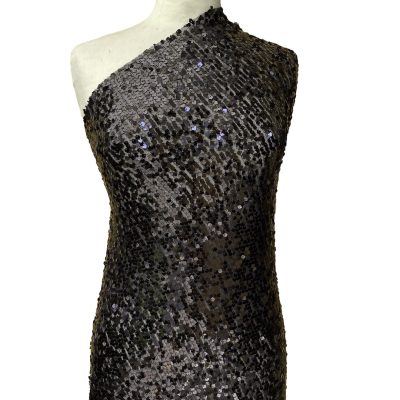 Tessuto in tulle con paillettes nere 1