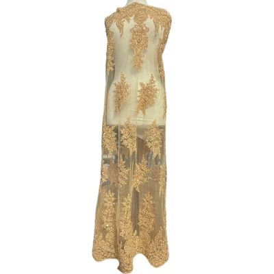 Pizzo in tulle con preziosi ricami oro 1