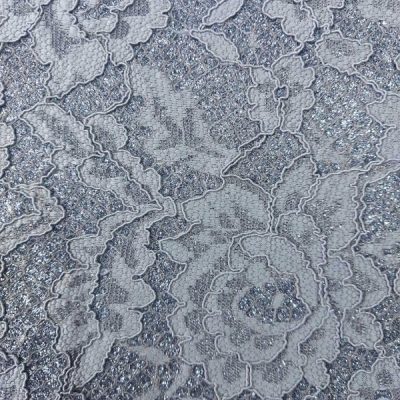 Pizzo da abbigliamento grigio su base glitterata 3