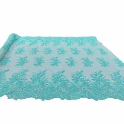 Pizzo su tulle con ricamo macarme acquamarina 2