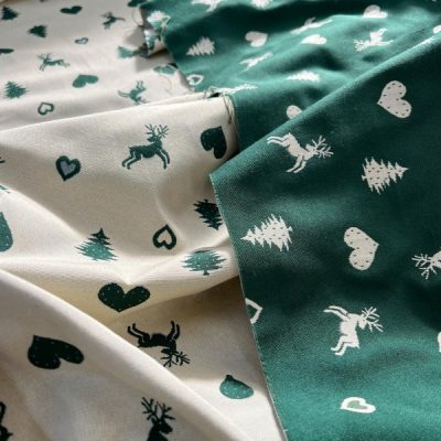 Misto cotone double face motivo tirolese - panna e verde Alt.280 cm