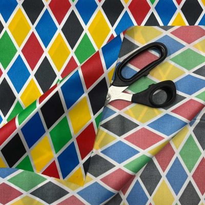Tessuto carnevale raso stampato arlecchino al metro dettaglio forbice