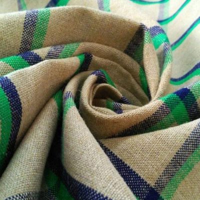 Tessuto Cotone in stile country moderno - beige motivi blu e verdi Alt.150cm